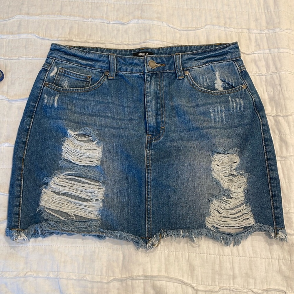 Ripped denim skirt